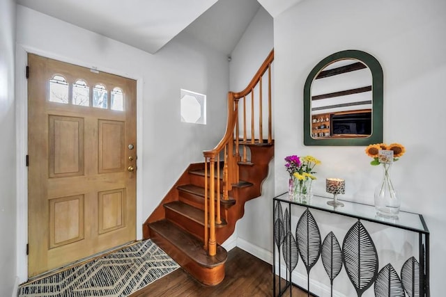 foyer featuring dark wood-type flooring