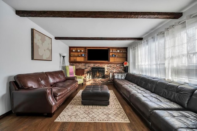 living room with beam ceiling, a fireplace, and dark hardwood / wood-style floors