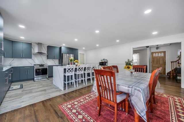 dining space featuring light hardwood / wood-style floors