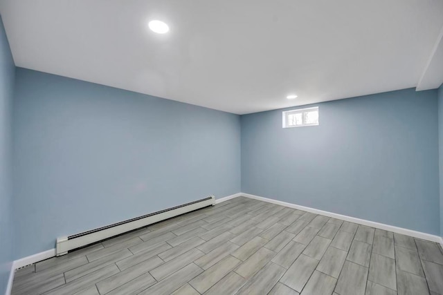 empty room with a baseboard heating unit