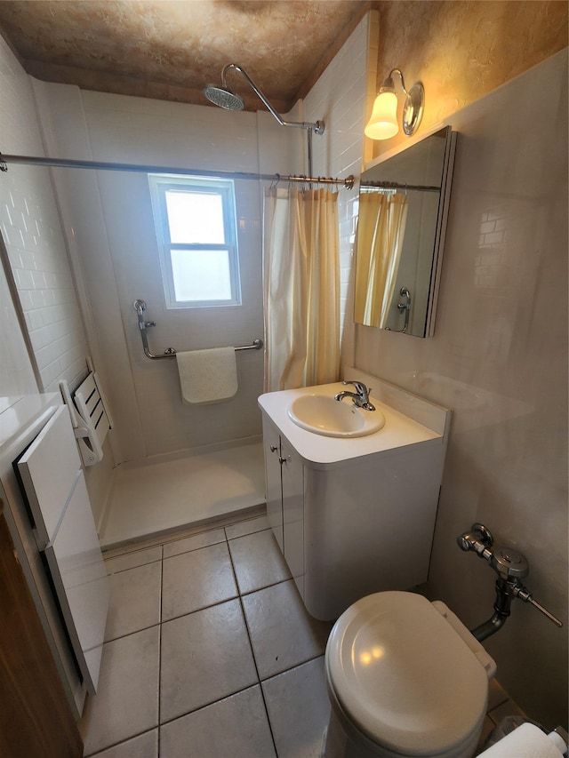 bathroom featuring vanity, tile patterned floors, toilet, and a shower with shower curtain