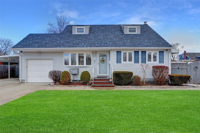 view of front facade with a garage and a front yard