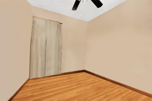 spare room featuring ceiling fan and light wood-type flooring