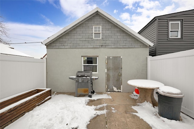 view of snow covered property