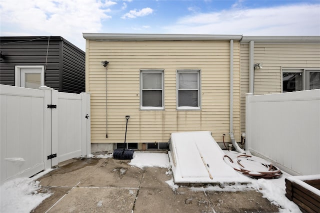 view of snow covered house