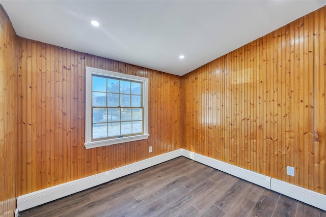 spare room featuring hardwood / wood-style floors