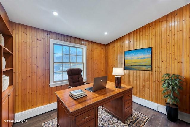 office area featuring a baseboard radiator and dark wood-type flooring