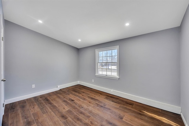 empty room featuring dark hardwood / wood-style floors