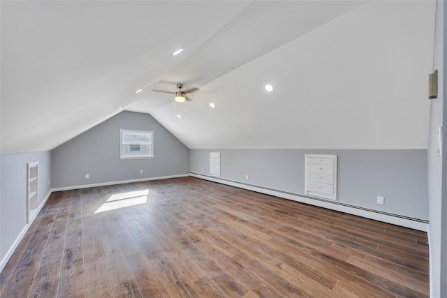 bonus room with lofted ceiling, hardwood / wood-style floors, a baseboard radiator, and ceiling fan