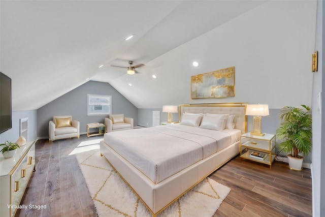 bedroom with lofted ceiling, hardwood / wood-style flooring, and ceiling fan