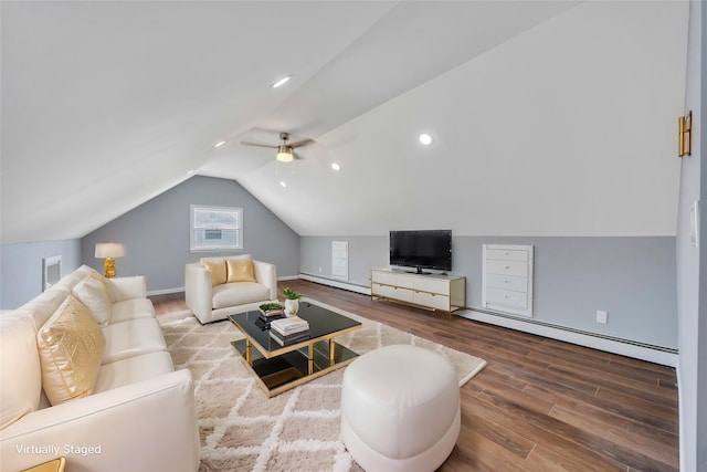 living room with baseboard heating, ceiling fan, lofted ceiling, and hardwood / wood-style floors