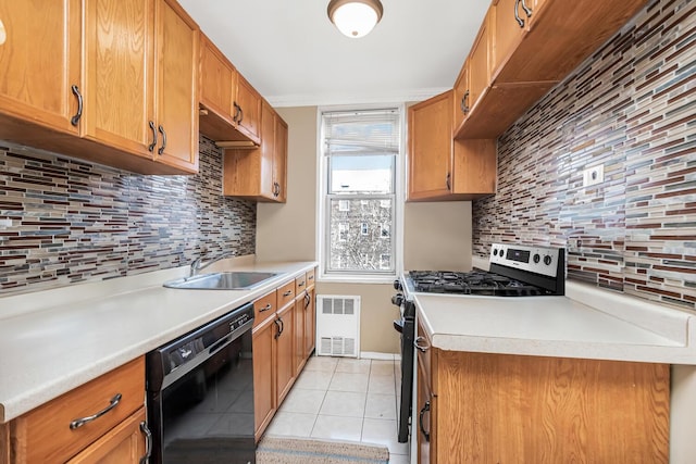 kitchen with stainless steel range oven, sink, tasteful backsplash, light tile patterned floors, and dishwasher