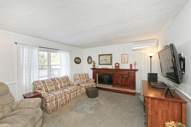 carpeted living room featuring crown molding, a wall mounted air conditioner, and a textured ceiling