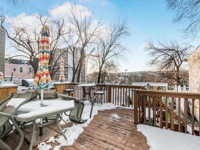 view of snow covered deck