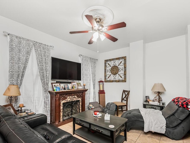 tiled living room featuring ceiling fan