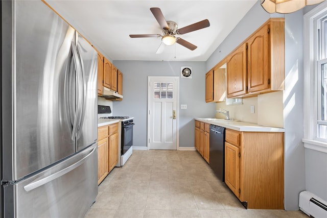 kitchen with sink, stainless steel refrigerator, dishwasher, gas range oven, and a baseboard radiator