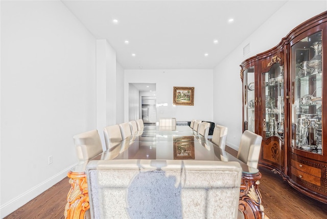 dining room featuring dark wood-type flooring