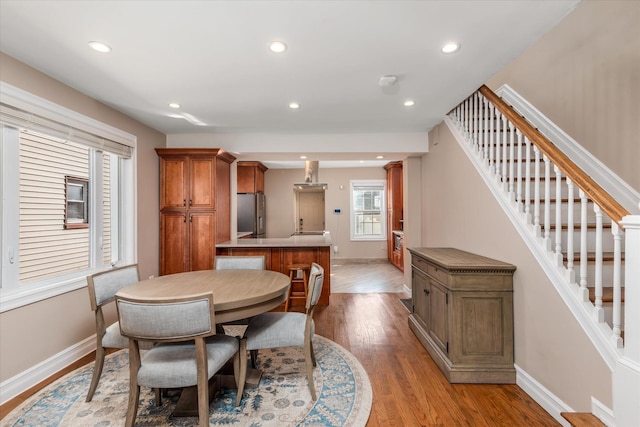 dining room with light wood-type flooring