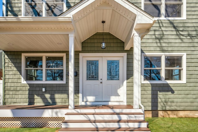 property entrance featuring covered porch