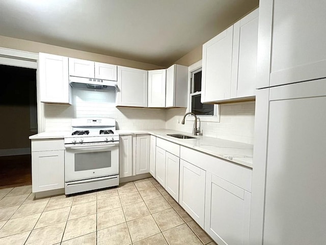 kitchen featuring white cabinetry, sink, and white range with gas stovetop