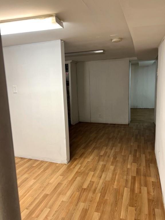 empty room featuring wood-type flooring