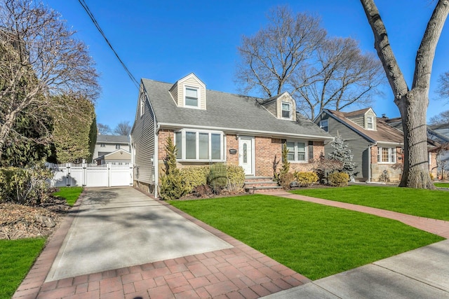 cape cod house featuring a front lawn