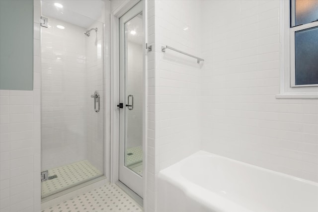 bathroom with independent shower and bath