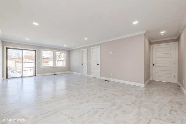 unfurnished room featuring crown molding