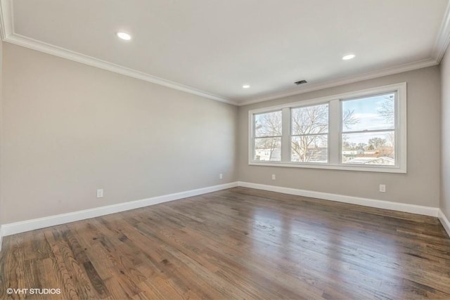 unfurnished room featuring crown molding and dark hardwood / wood-style floors