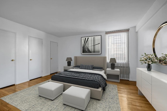 bedroom featuring light hardwood / wood-style floors