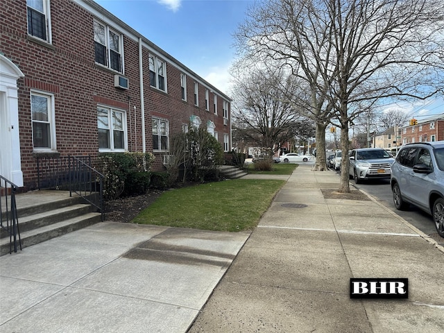 view of street featuring a residential view and sidewalks