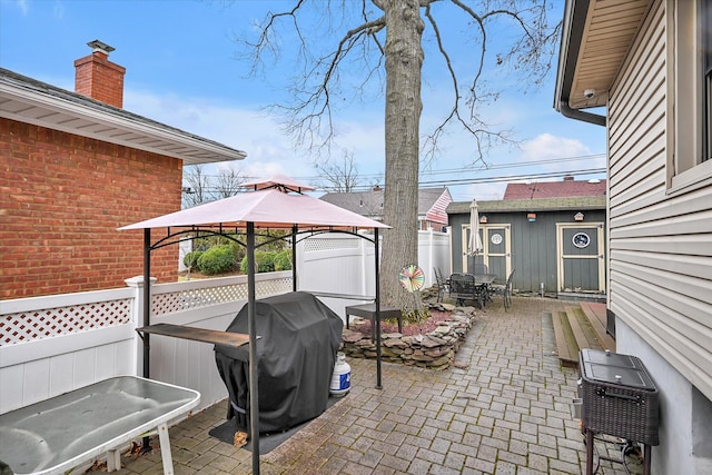 view of patio / terrace with a gazebo and grilling area