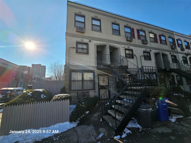 view of property featuring central air condition unit