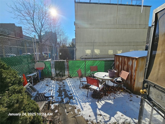 view of snow covered patio