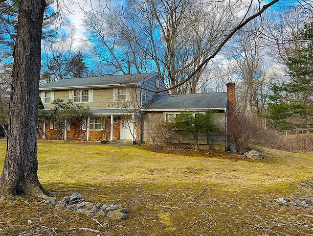 view of front property with a front lawn