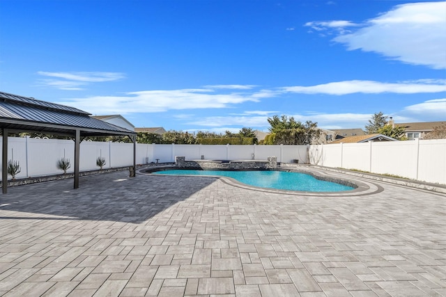 view of swimming pool with a gazebo and a patio