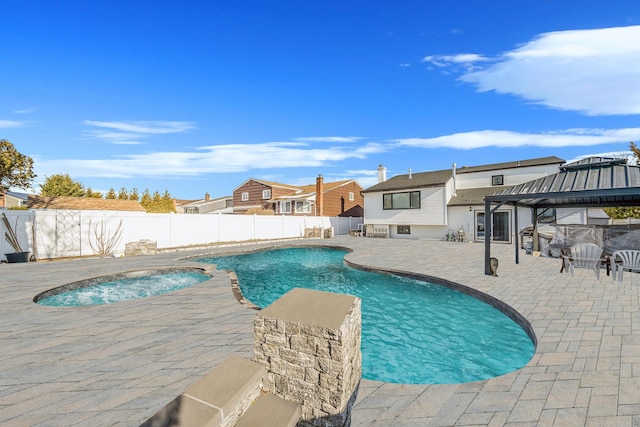 view of swimming pool featuring a gazebo and a patio area