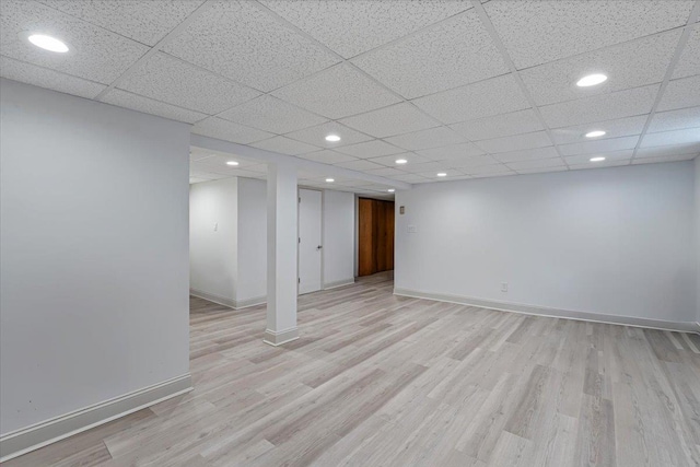 basement featuring light hardwood / wood-style floors