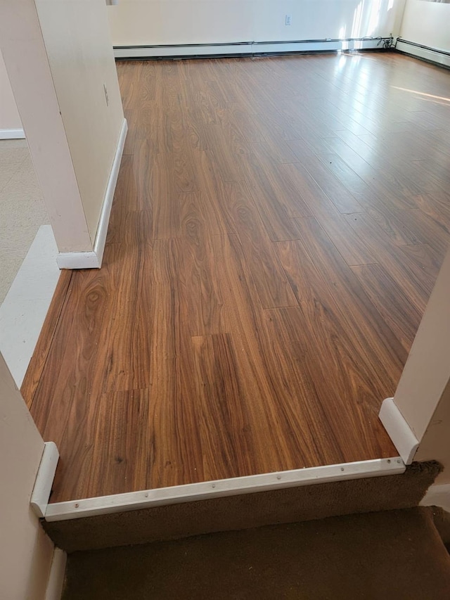 interior details featuring hardwood / wood-style flooring