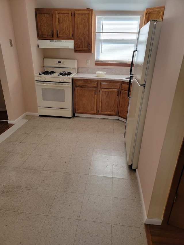 kitchen featuring white appliances