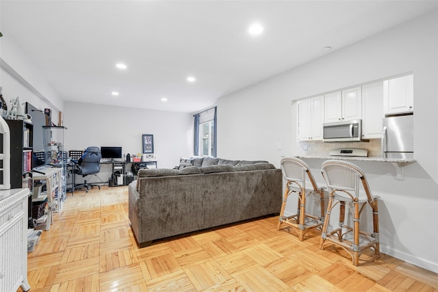 living room with light parquet floors