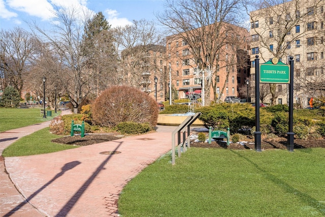 view of home's community featuring a lawn