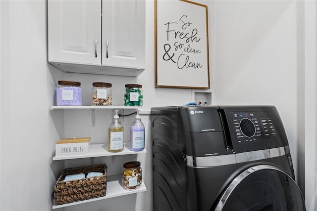 washroom with cabinets and independent washer and dryer