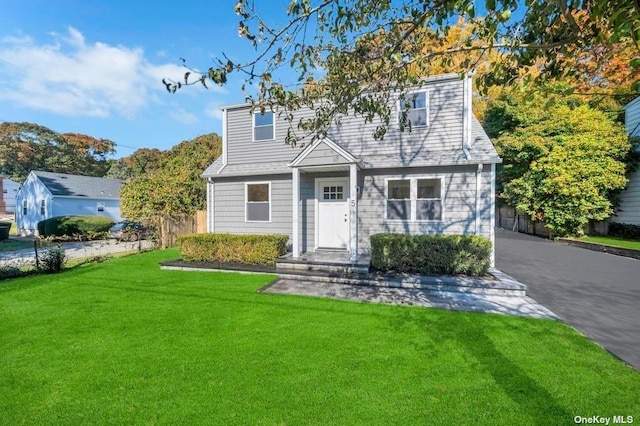 view of front of property with a front lawn