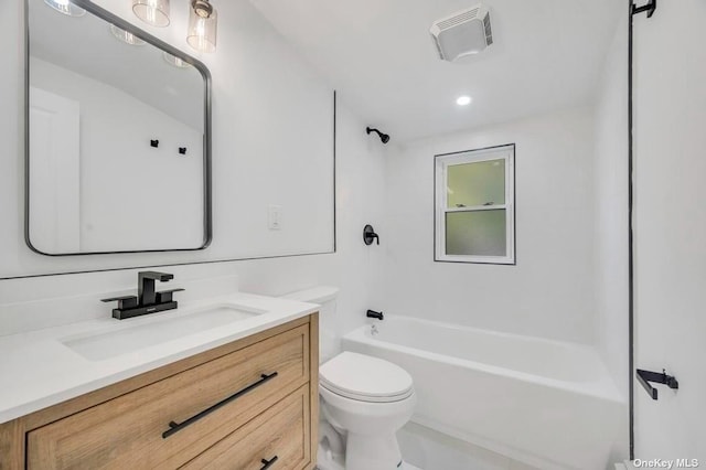 full bathroom featuring vanity, shower / tub combination, and toilet