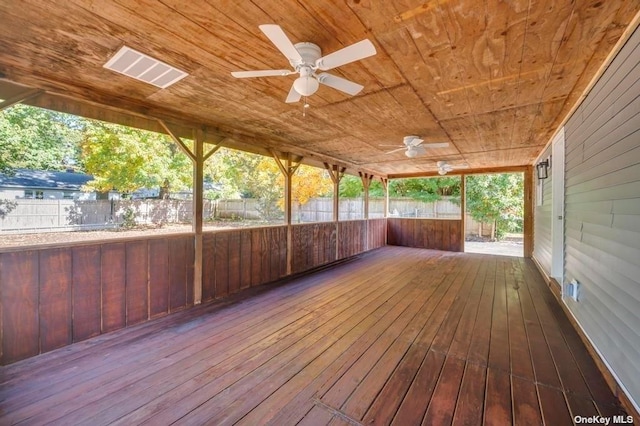 wooden terrace featuring ceiling fan