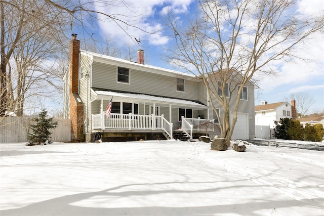 view of front facade with a porch and a garage