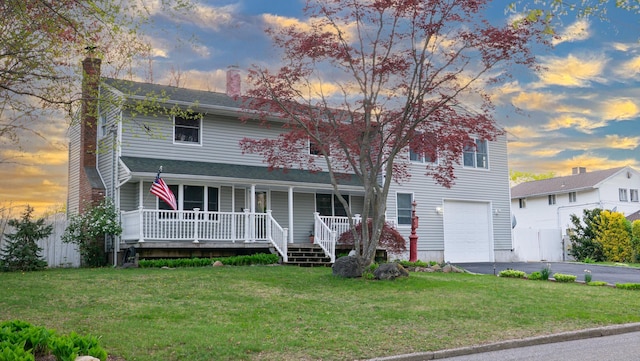 4 Young Rd, Coram, NY 11727 - view of front facade with a chimney, covered porch, aphalt driveway, a garage, and a front yard