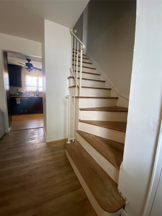 4 Young Rd, Coram, NY 11727 - stairs featuring baseboards, wood finished floors, and ceiling fan