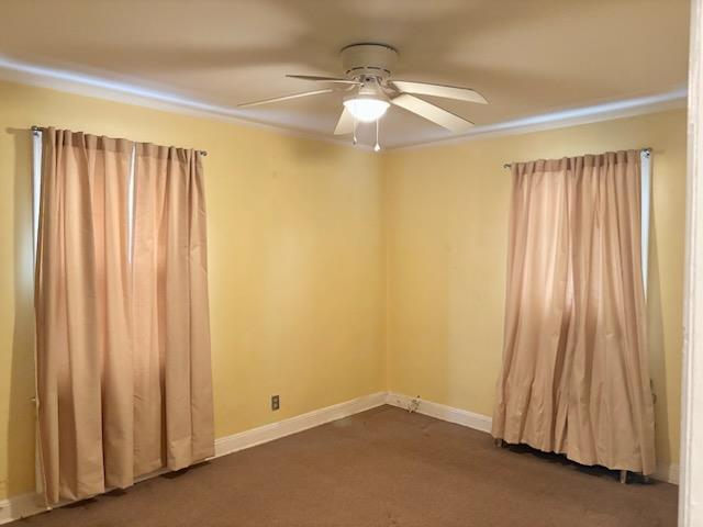 221-14 114th Rd, Cambria Heights, NY 11411 - spare room with ceiling fan and baseboards